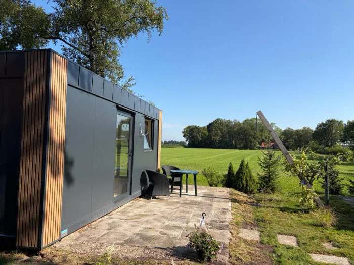 De Tuin Suite met terras aan de rand van het weiland
